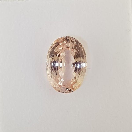 6.17ct Oval Faceted Pale Peach Sapphire 12.7x8.8m - Dynagem